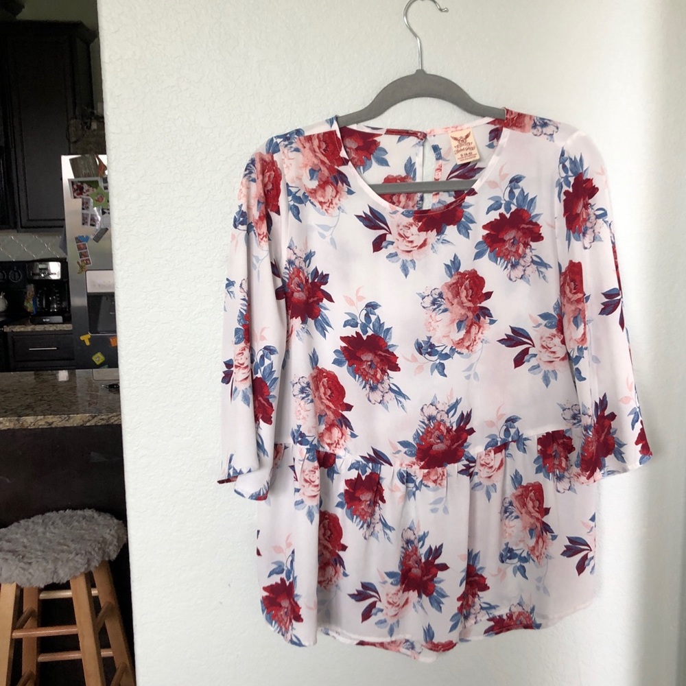 Rosy floral peplum swing top